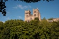 Durham England: 2022: Durham Cathedral exterior during sunny summer day. View from river wear with lush green trees