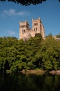 Durham England: 2022: Durham Cathedral exterior during sunny summer day. View from river wear with lush green trees