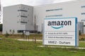 Amazon warehouse for shipping of online purchases. Exterior of building showing sign