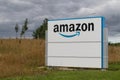 Sign outside Amazon warehouse for shipping of online purchases showing logo