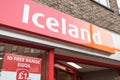 Exterior of Iceland frozen food shop store showing sign, signage, logo and branding above top of entrance