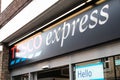 Exterior view of entrance to Tesco Express supermarket showing sign, signage, logo and branding above entrance Royalty Free Stock Photo