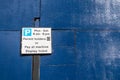 Parking restrictions sign with information for payment and permit holders on public Royalty Free Stock Photo