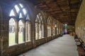 Durham, UK - 12 July, 2023: Cloisters and interior lawn of Durham Cathdral, England