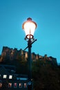 Old lamp post on Framwellgate Bridge in evening with Durham Castle in background