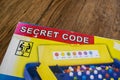 Secret Code is a cheaper version of the classic strategic Mastermind board game. A code-breaking game for two players