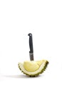 The durian with black knife Royalty Free Stock Photo