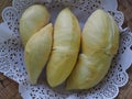 Durian fruit - durian in white paper on bamboo weave tray Royalty Free Stock Photo