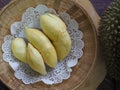 Durian fruit - durian on white paperon bamboo weave tray Royalty Free Stock Photo