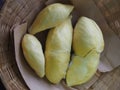 Durian fruit - durian on brown paperon bamboo weave tray