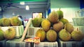 Durian fruits piled on crates