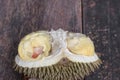 Durian peeled ripe close up, King of fruit on the wood