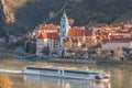 Durnstein village during spring time with tourist ship on Danube river in Wachau (UNESCO), Austria Royalty Free Stock Photo