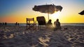 senior couple of old man and woman sitting on the beach watching sunset Royalty Free Stock Photo