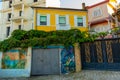 DURRES, ALBANIA: An old building with graffiti drawings on the walls in the center of Durres.