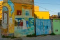 DURRES, ALBANIA: An old building with graffiti drawings on the walls in the center of Durres.