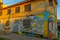 DURRES, ALBANIA: An old building with graffiti drawings on the walls in the center of Durres.