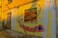 DURRES, ALBANIA: An old building with graffiti drawings on the walls in the center of Durres.