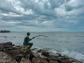 Durres - Fisherman sculpture at Vollga Waterfront Promenade in Durres, Albania