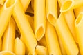 Durum wheat semolina pasta penne lisce close up Royalty Free Stock Photo