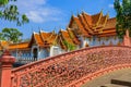 Dusit area,Bangkok,Thailand on May 1,2020:Red bridge across the ditch at Wat Benchamabophit Dusitvanaram.selective focus