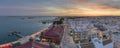 Dusk aerial cityscape in Olhao, Algarve fishing village view of ancient neighbourhood and its traditional cubist architecture.