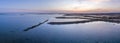 Dusk aerial panoramic seascape view of Olhao salt marsh Inlet.