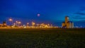 Dusk / blue hour with blood moon at the San Jose beach of Encarnacion in Paraguay.