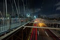 Dusk busy traffic over Brooklyn Bridge with Lower Manhattan Skyline, New York United States Royalty Free Stock Photo