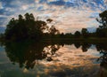 Dusk dawn nature landscape reflection on lake surface Royalty Free Stock Photo