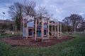 Dusk falls over the suburbs of Manchester. Playground at night..