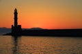 Dusk at harbor with lighthouse Chania Crete Royalty Free Stock Photo