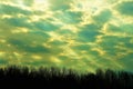 Shafts of Light in Cloudy Sky at Dusk in Late November Royalty Free Stock Photo