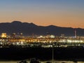 Dusk high angle view of the skyline of Las Vegas with Excavator below Royalty Free Stock Photo