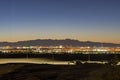 Dusk high angle view of the skyline of Las Vegas with Excavator below Royalty Free Stock Photo