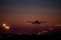 Dusk Jet Landing 1 Royalty Free Stock Photo