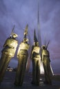 Dusk light behind bronze Honor Guard and three soaring spires of the Air Force Memorial, One Air Force Memorial Drive, Arlington,