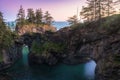 Dusk at Natural Bridges along Samuel H. Boardman State Scenic Corridor, Oregon during a golden hour sunset. USA