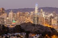 Dusk over San Francisco Downtown with Columbus Day Lights. Royalty Free Stock Photo