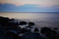 Dusk at a rockey sea shore Royalty Free Stock Photo