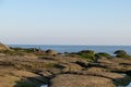 At dusk, the sea on the coast slapped the rocks Royalty Free Stock Photo