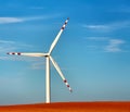 Dusk skies over windmill turbines