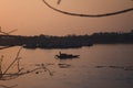 Dusk time, a boat floating over river ganga, sunset, natural beauty Royalty Free Stock Photo