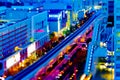 A dusk of the train on the city railway in Tokyo high angle tiltshift Royalty Free Stock Photo