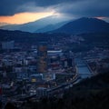Dusk, twilight over Bilbao city in Basque Country, Spain. Town between mountains. Royalty Free Stock Photo