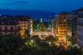 Dusk view of Geneva city streets with buildings, Geneva Lake Lac Leman and lighthouse during beautiful summer night, Geneva, Royalty Free Stock Photo