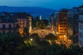 Dusk view of Geneva city streets with buildings, Geneva Lake Lac Leman and lighthouse during beautiful summer night, Geneva, Royalty Free Stock Photo