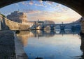 Dusk view thrue bridge arch. The Mausoleum of Hadrian (or Castle of Holy Angel) in Rome, Italy.