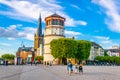 DUSSELDORF, GERMANY, AUGUST 10, 2018: View of Burgplatz with Schifffahrt museum and Saint Lambertus church in Dusseldorf, Germany