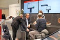 DUSSELDORF GERMANY - 26.02.2023-2.03.2023: EuroShop, THE LEADING TRADE FAIR FOR RETAIL TECHNOLOGY, communicate at the exhibition